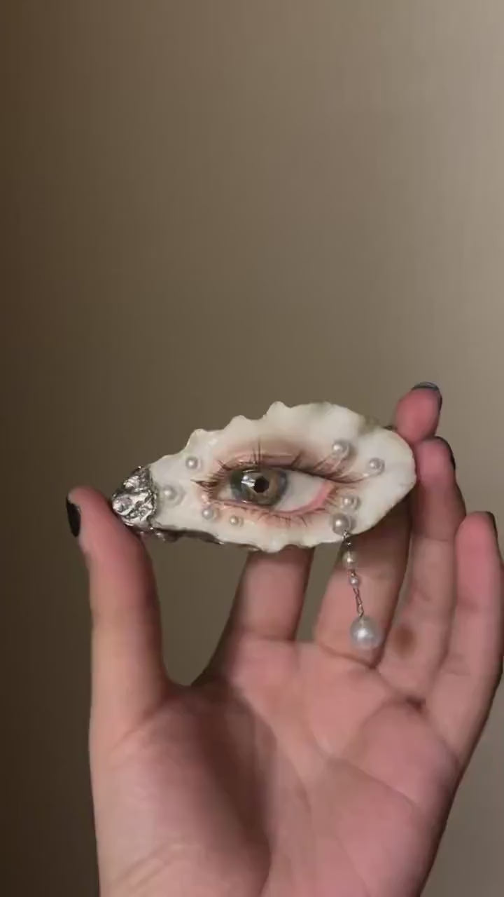 Nyra Halo Brown Eye Oyster Relic — Choker, Brooch or Charm — product video