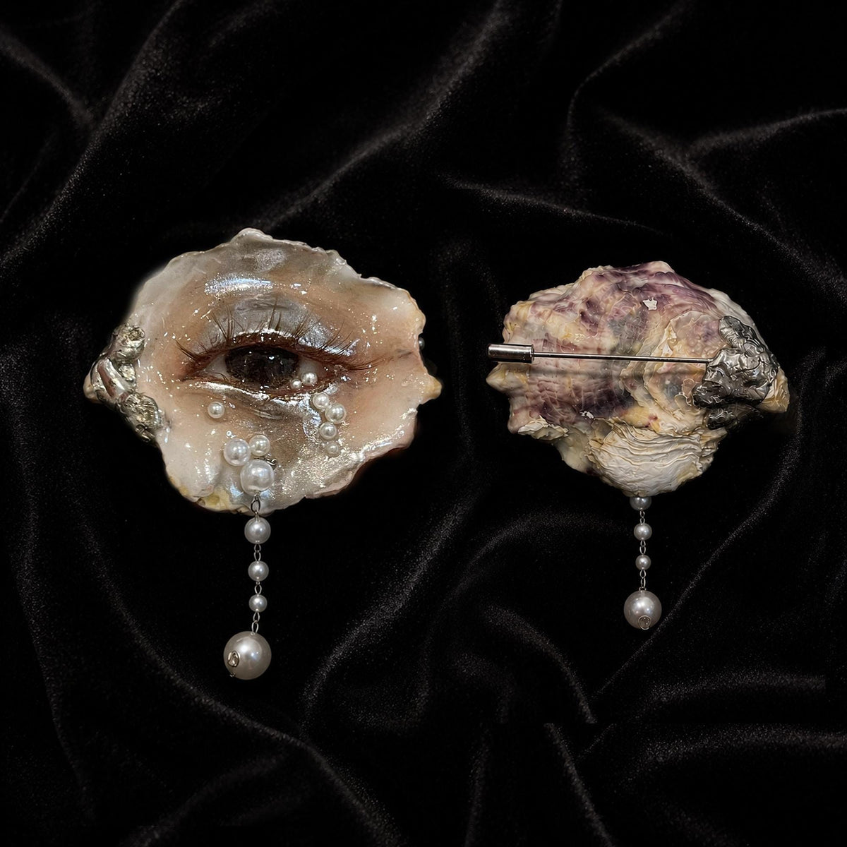Front-and-back view of Brown Smoky Oyster Eye showing the artwork and brooch pin.