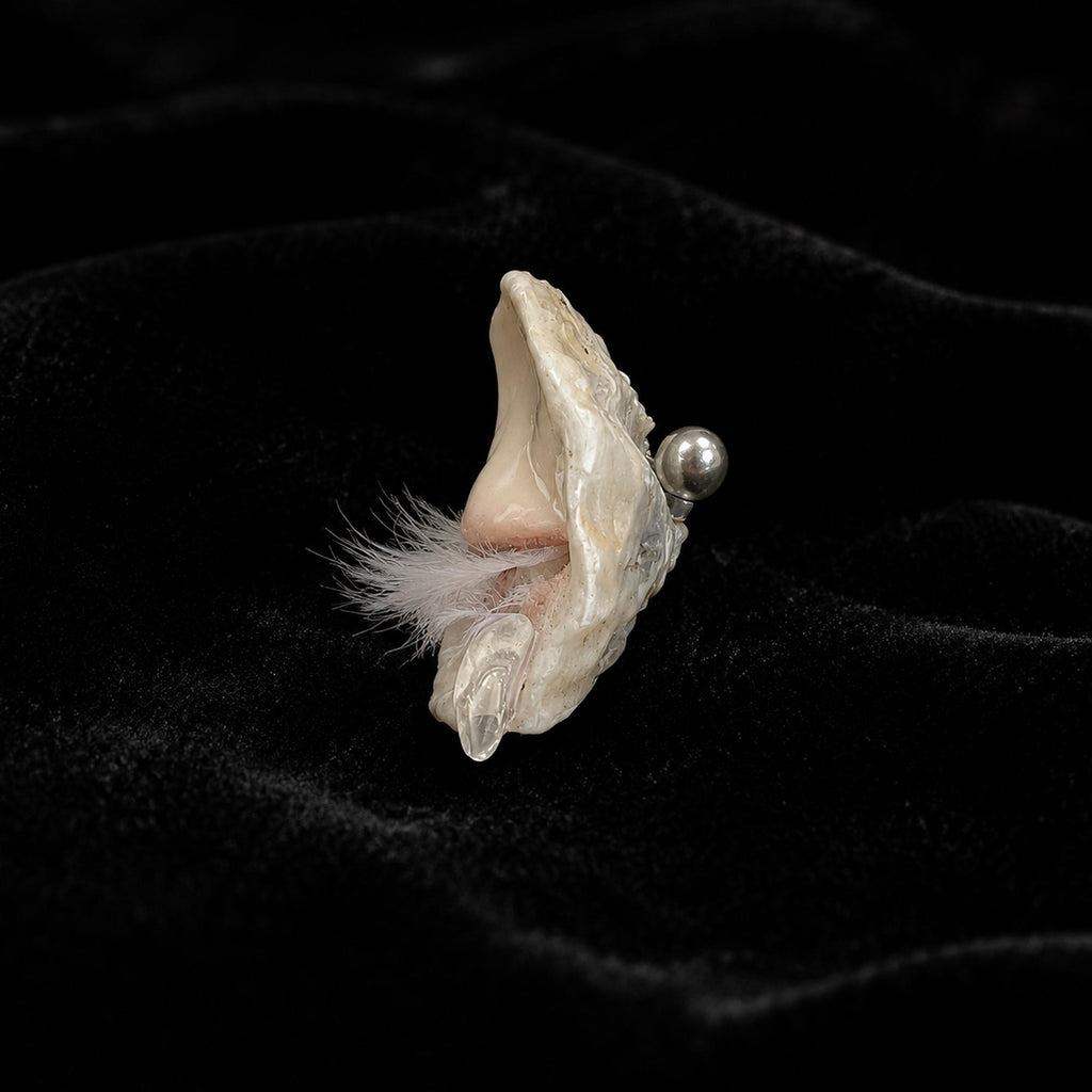 Side profile of Nyra Sleeping Beauty showing the shell depth and pale eyelashes.