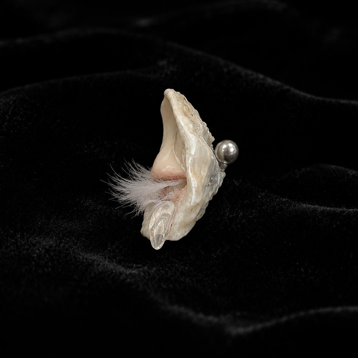 Side profile of Nyra Sleeping Beauty showing the shell depth and pale eyelashes.